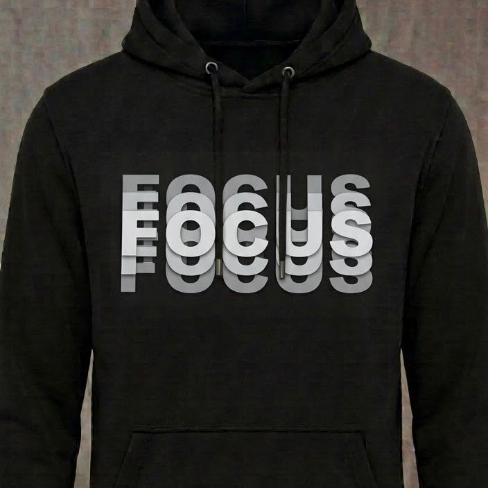 Coming Into Focus distressed graphic unisex hoodie in black — bold blurred typography graphic — Reborn XII